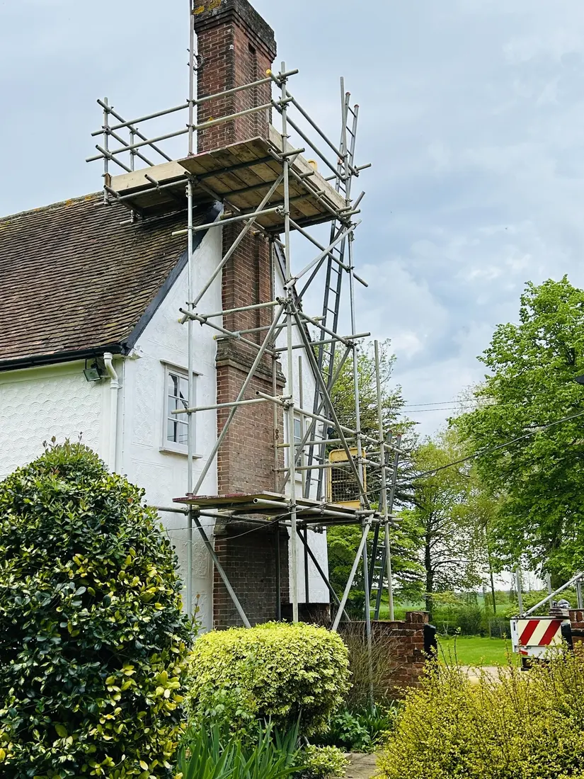 Tall chimney stack scaffold on a period house