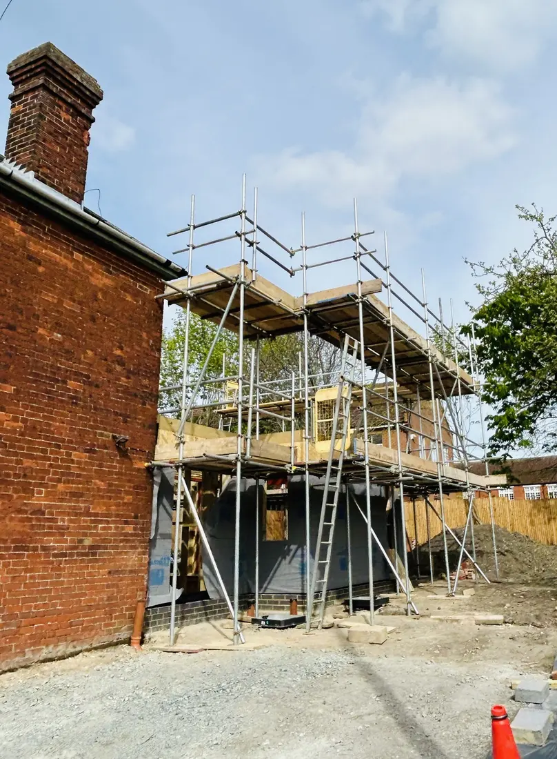 Scaffold around a timber-frame build by Falcon Scaffolding