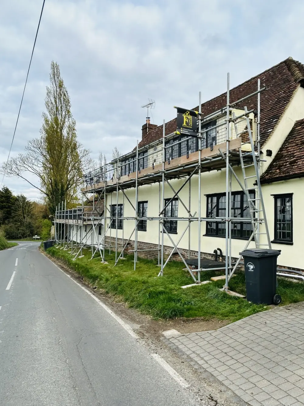 Scaffolding on a roadside cottage in the Essex countryside